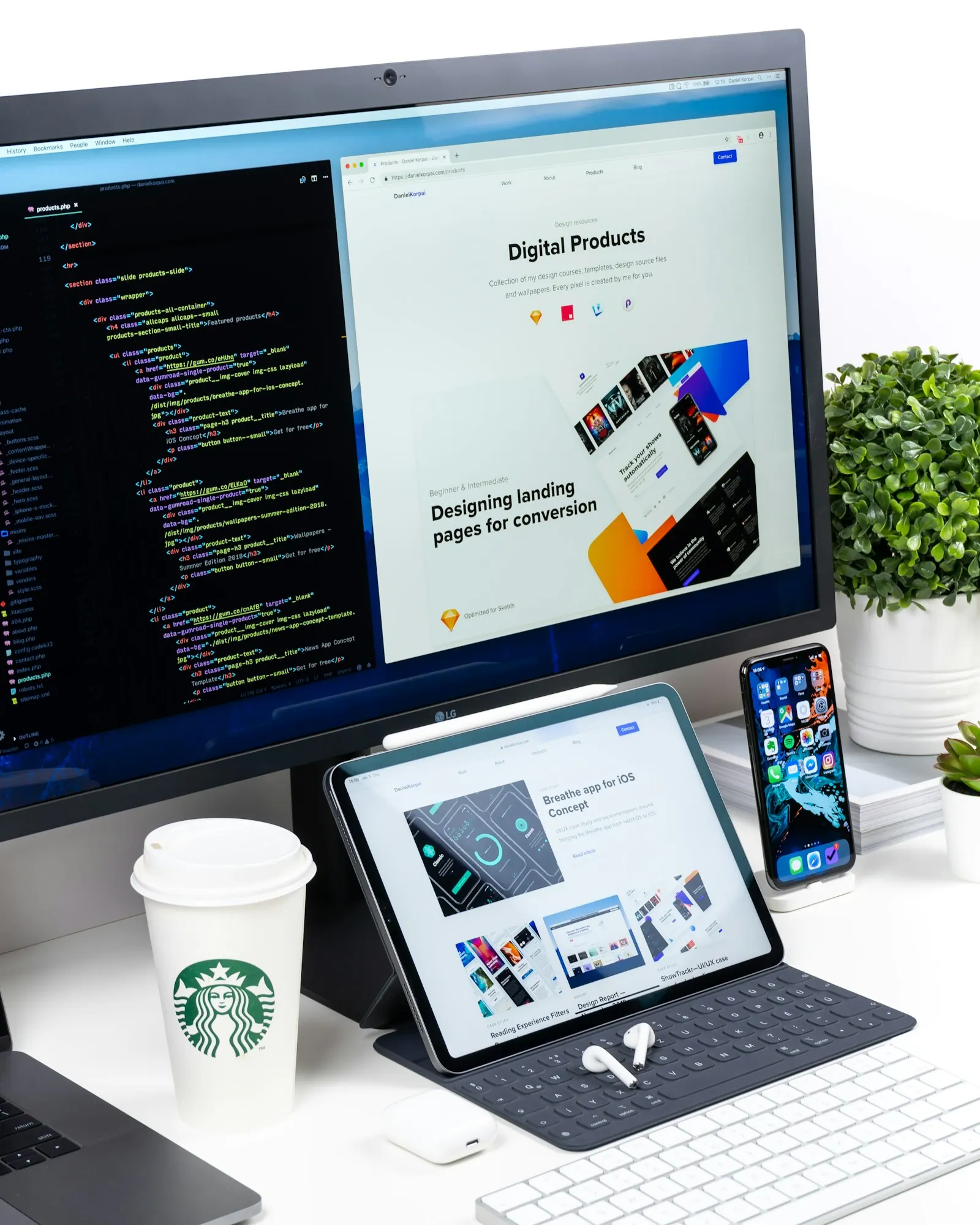 A website shown across a laptop, tablet and phone on a desk